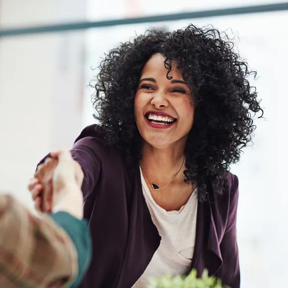 Woman shaking hands with someone